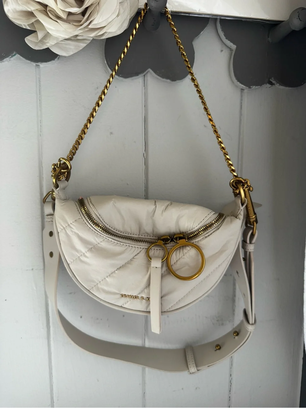 Charles & Keith Minimalist Crescent Crossbody Bag in cream with Gold Chain